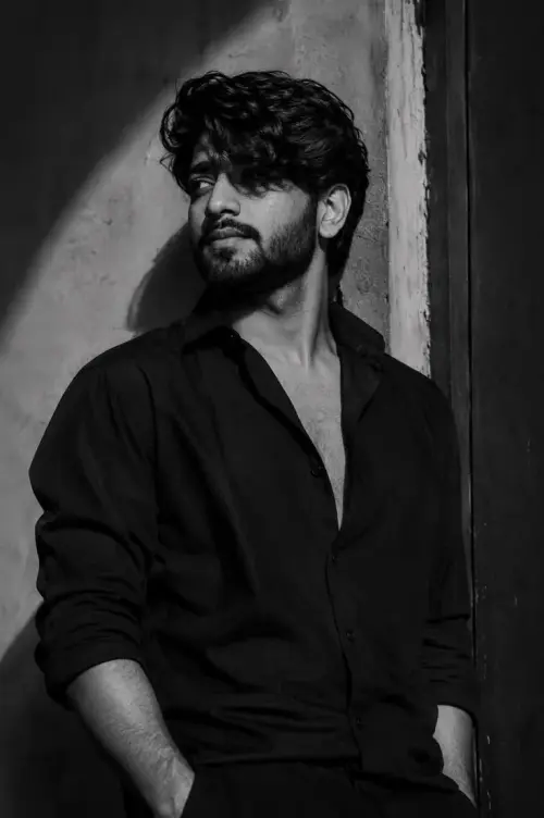 Black Shirt Aesthetic 🖤 | Moody Black & White Men's Portrait Photography — AI Photo Editing Prompt on Faymas