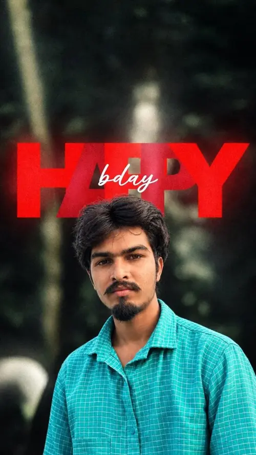 Candid Outdoor Birthday Portrait of South Asian Young Man in Teal Grid Shirt with Glowing Red Typography Overlay — AI Photo Editing Prompt on Faymas