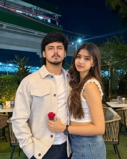 Romantic Nighttime Couple Portrait with Red Rose — AI Photo Editing Prompt on Faymas