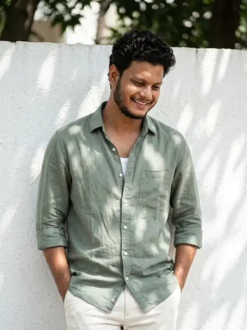 Casual Smile Against White Wall — AI Photo Editing Prompt on Faymas